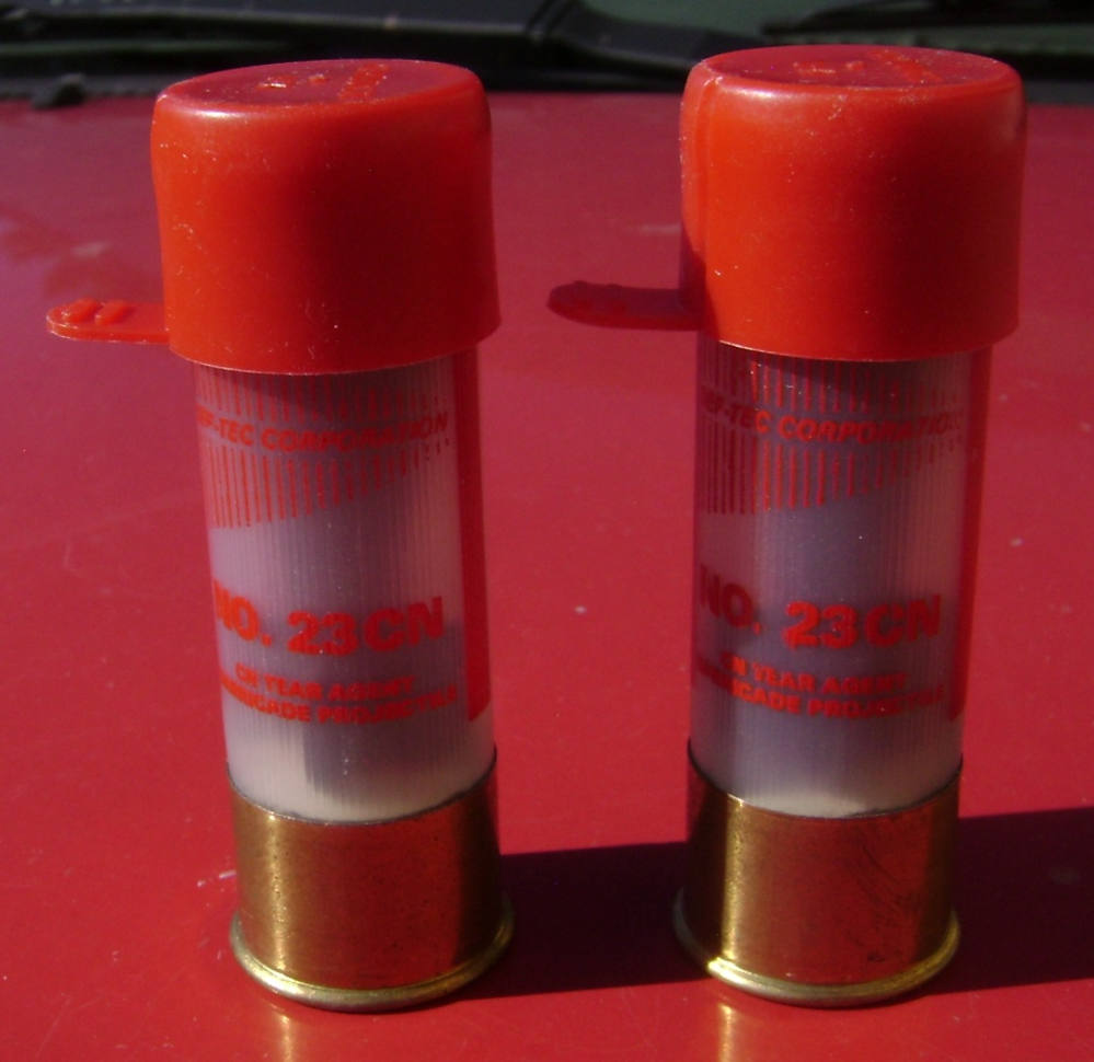 Pair of Live Liquid Barricade 12ga CN Tear Gas Rounds Defense Technology-img-0
