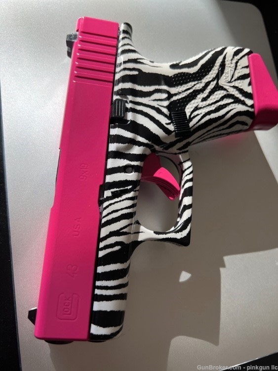 Customized Glock G43 9mm – Zebra Print Frame & Signature Pink Accents-img-1