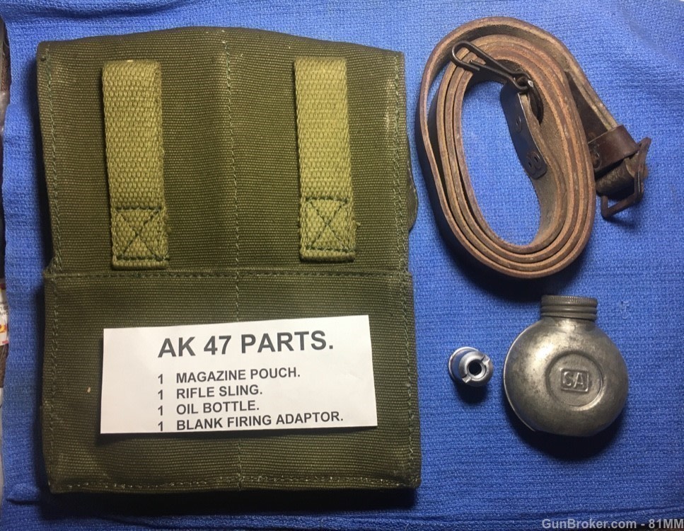 AK 47 parts. Sling, Oil bottle, Mag pouch & blank adapter.-img-0