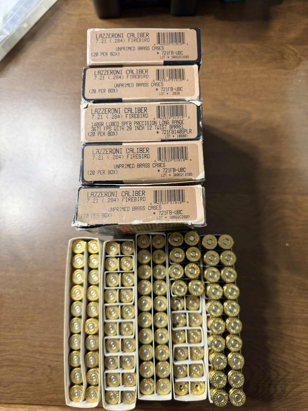 Lazzeroni 7.21 firebird ammo & brass lot. 28 rounds 72 pieces brass -img-0