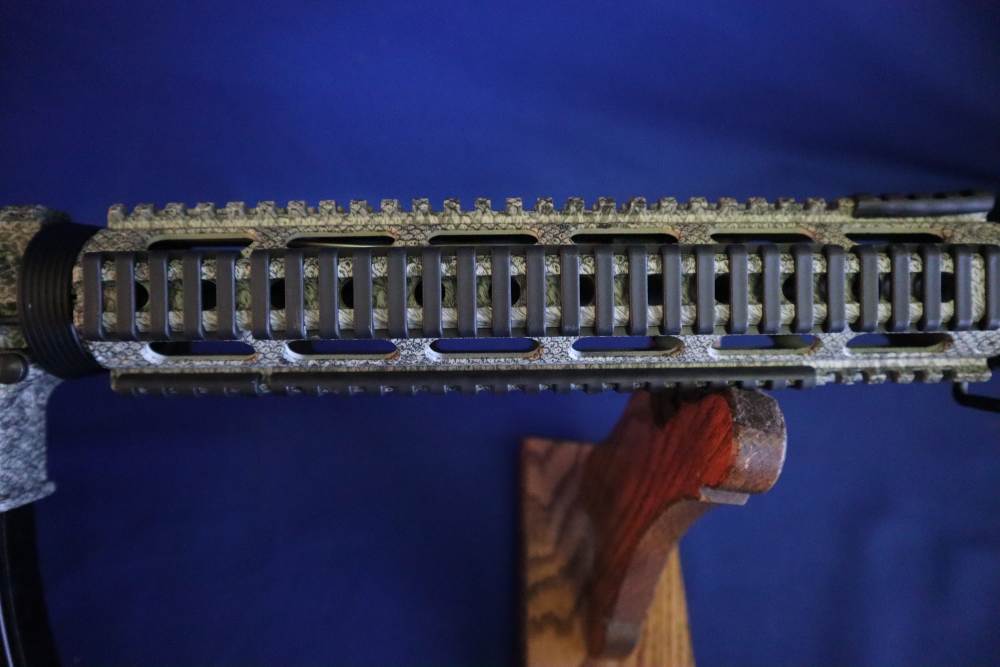 Bushmaster xm15 e2s snake skin factory finish in 98% minty condition -img-4