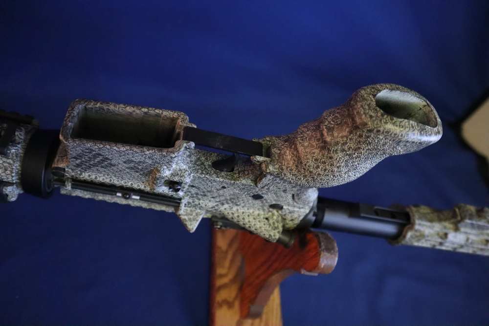 Bushmaster xm15 e2s snake skin factory finish in 98% minty condition -img-44