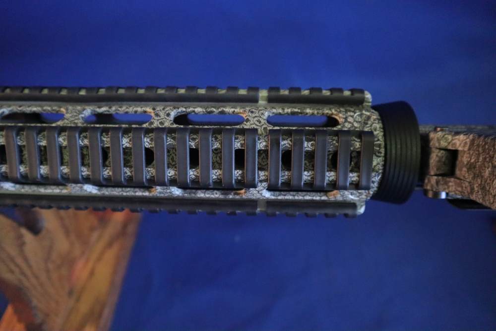 Bushmaster xm15 e2s snake skin factory finish in 98% minty condition -img-39