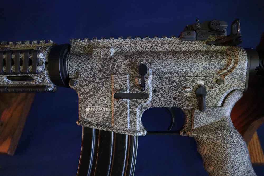 Bushmaster xm15 e2s snake skin factory finish in 98% minty condition -img-24
