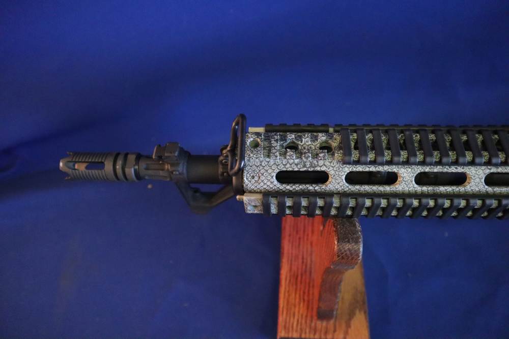 Bushmaster xm15 e2s snake skin factory finish in 98% minty condition -img-42