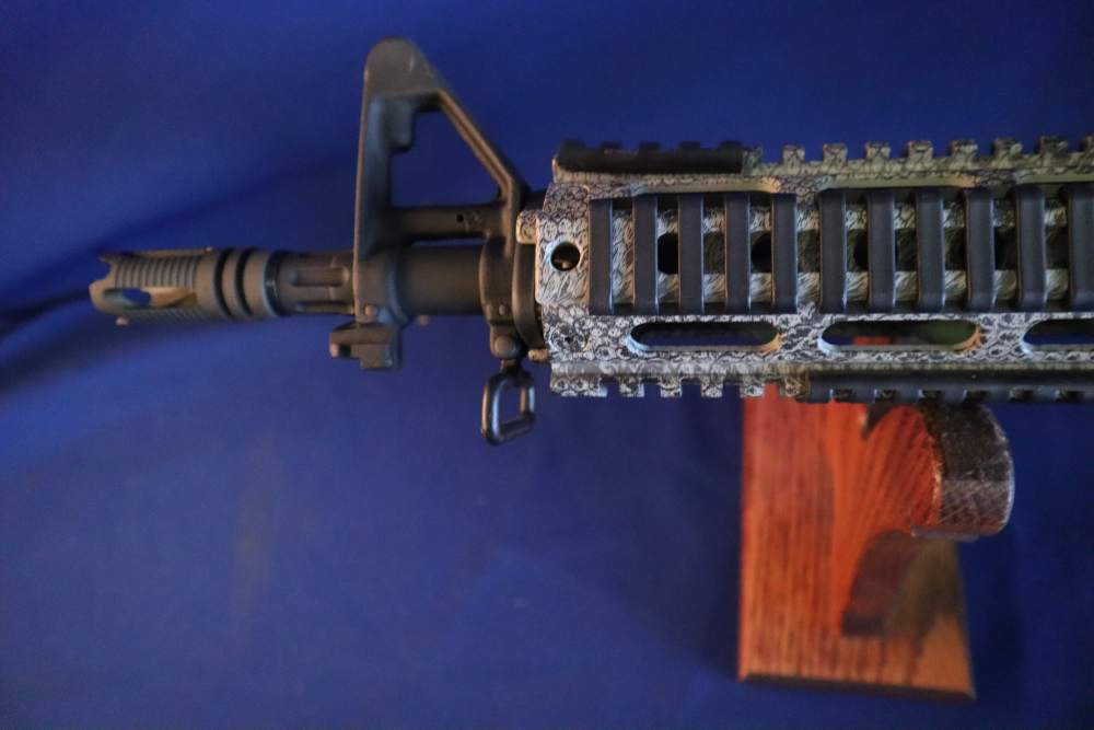 Bushmaster xm15 e2s snake skin factory finish in 98% minty condition -img-22