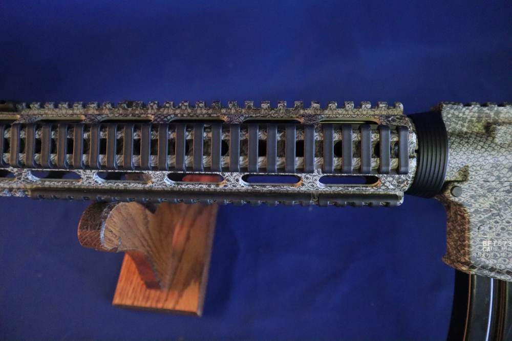Bushmaster xm15 e2s snake skin factory finish in 98% minty condition -img-23