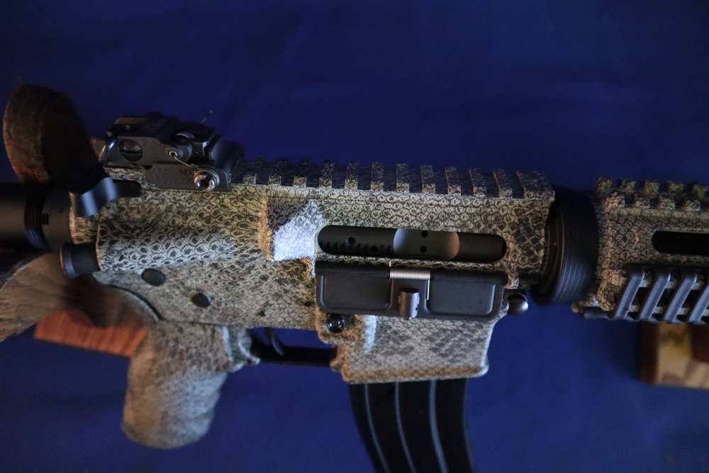 Bushmaster xm15 e2s snake skin factory finish in 98% minty condition -img-8