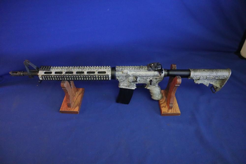 Bushmaster xm15 e2s snake skin factory finish in 98% minty condition -img-20