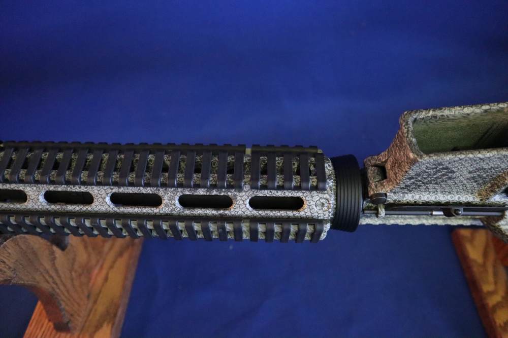 Bushmaster xm15 e2s snake skin factory finish in 98% minty condition -img-43