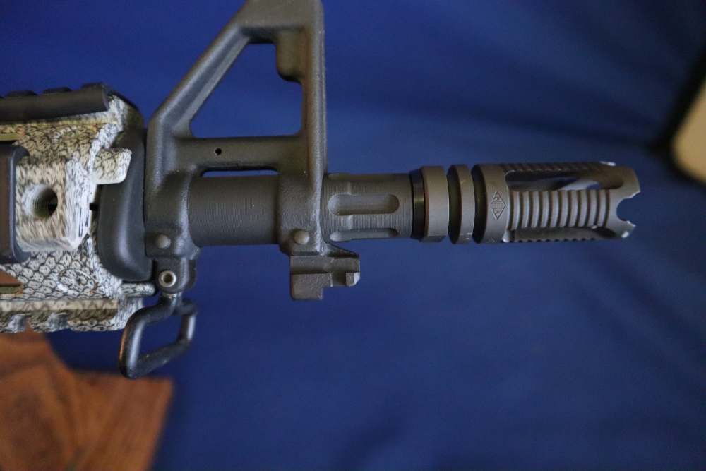 Bushmaster xm15 e2s snake skin factory finish in 98% minty condition -img-5