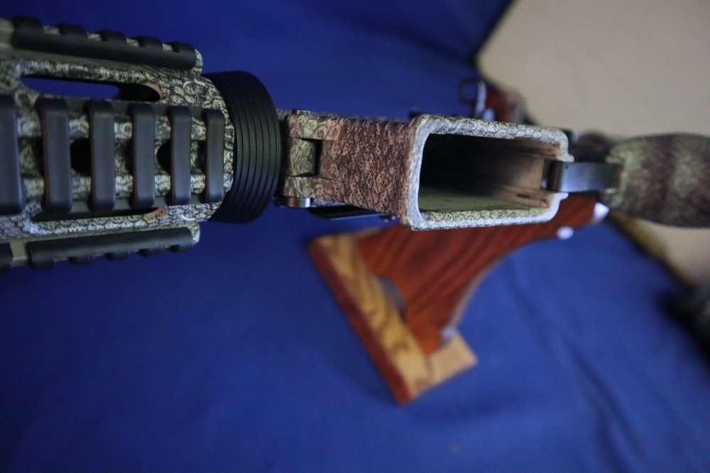 Bushmaster xm15 e2s snake skin factory finish in 98% minty condition -img-37