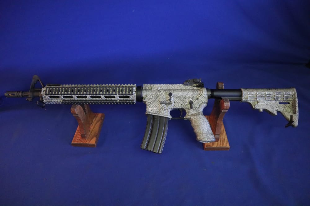 Bushmaster xm15 e2s snake skin factory finish in 98% minty condition -img-21