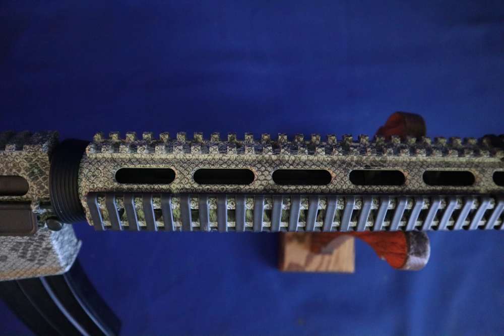 Bushmaster xm15 e2s snake skin factory finish in 98% minty condition -img-6