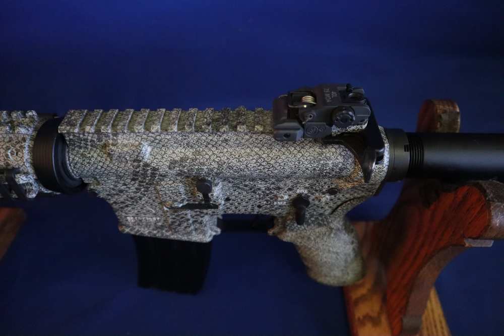 Bushmaster xm15 e2s snake skin factory finish in 98% minty condition -img-18