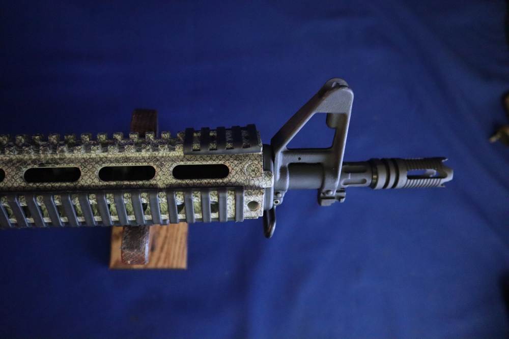 Bushmaster xm15 e2s snake skin factory finish in 98% minty condition -img-7