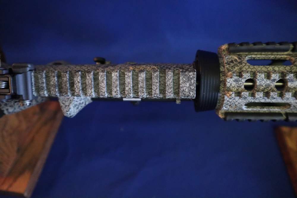 Bushmaster xm15 e2s snake skin factory finish in 98% minty condition -img-13