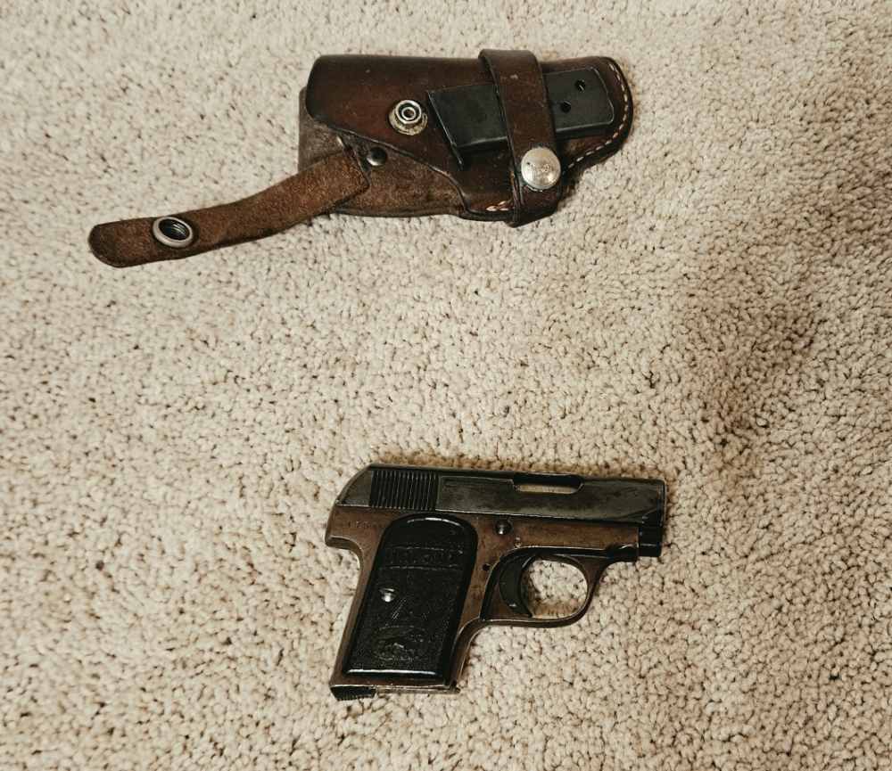 Unique Model 10 .25 ACP with holster and 2 mags-img-0