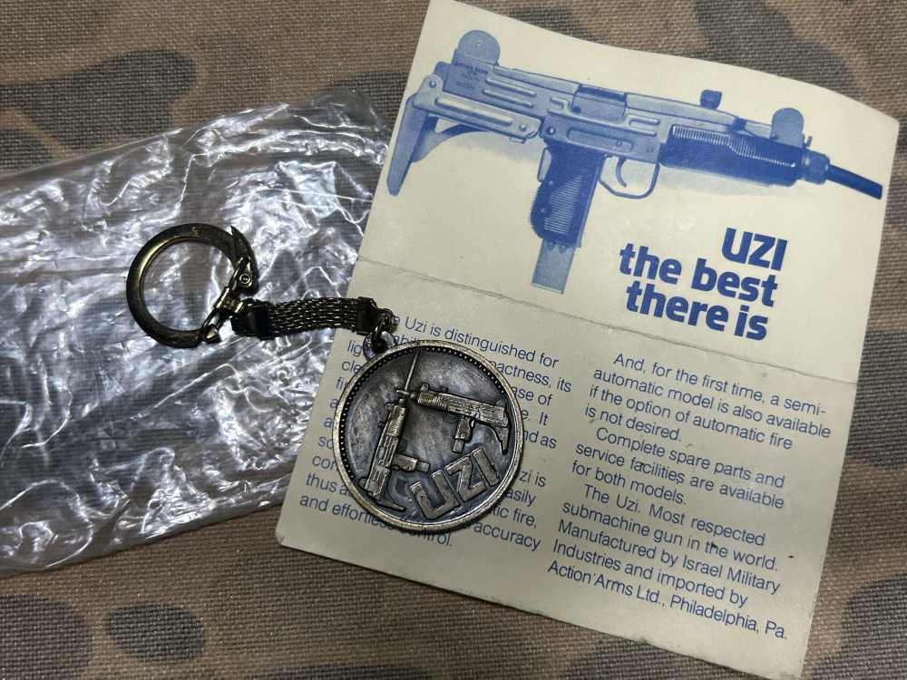 VTG 80s ACTION ARMS UZI bronze Keychain NOS MINT IN WRAP RARE collectible -img-1