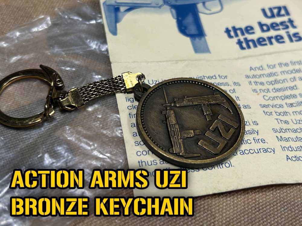 VTG 80s ACTION ARMS UZI bronze Keychain NOS MINT IN WRAP RARE collectible -img-0