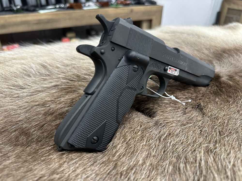 Springfield Armory M1911A1 .45acp w/ laser grips-img-1