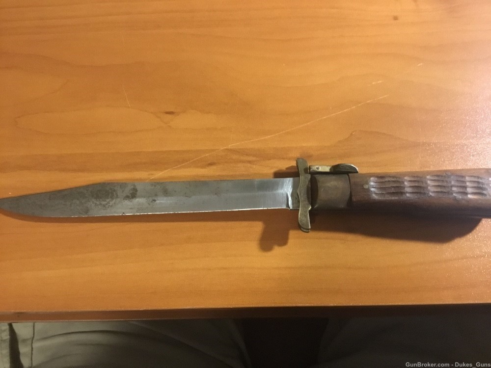 Knife, 8” blade. Folds into a 4 1/2” handle w/4” blade exposed-img-5