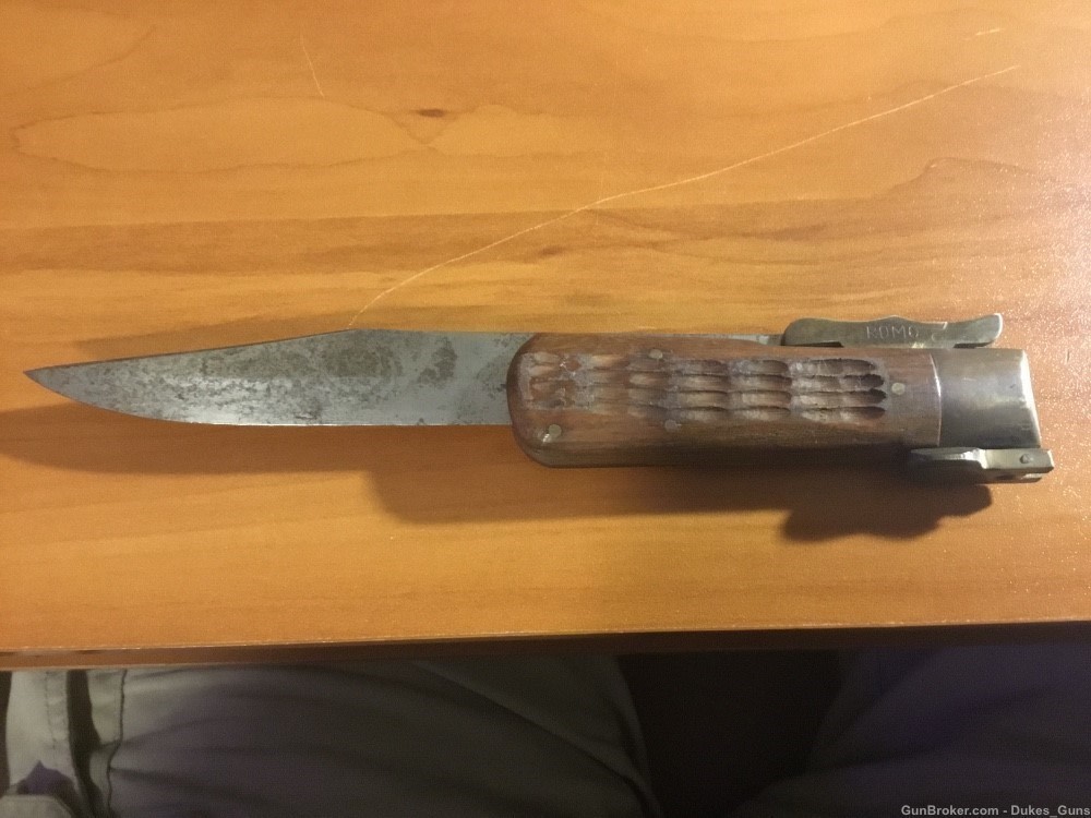 Knife, 8” blade. Folds into a 4 1/2” handle w/4” blade exposed-img-0
