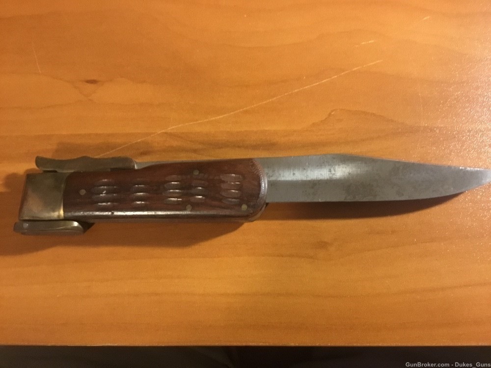 Knife, 8” blade. Folds into a 4 1/2” handle w/4” blade exposed-img-2