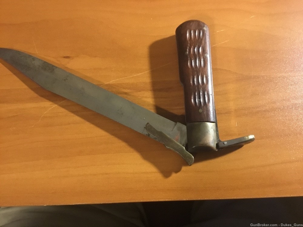 Knife, 8” blade. Folds into a 4 1/2” handle w/4” blade exposed-img-4