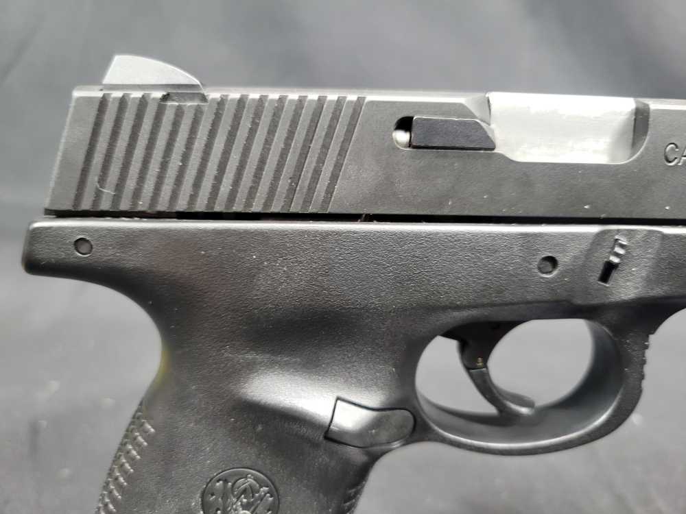 PENNY AUCTION SMITH & WESSON MODEL SW40F .40 S&W 15 RDS-img-9