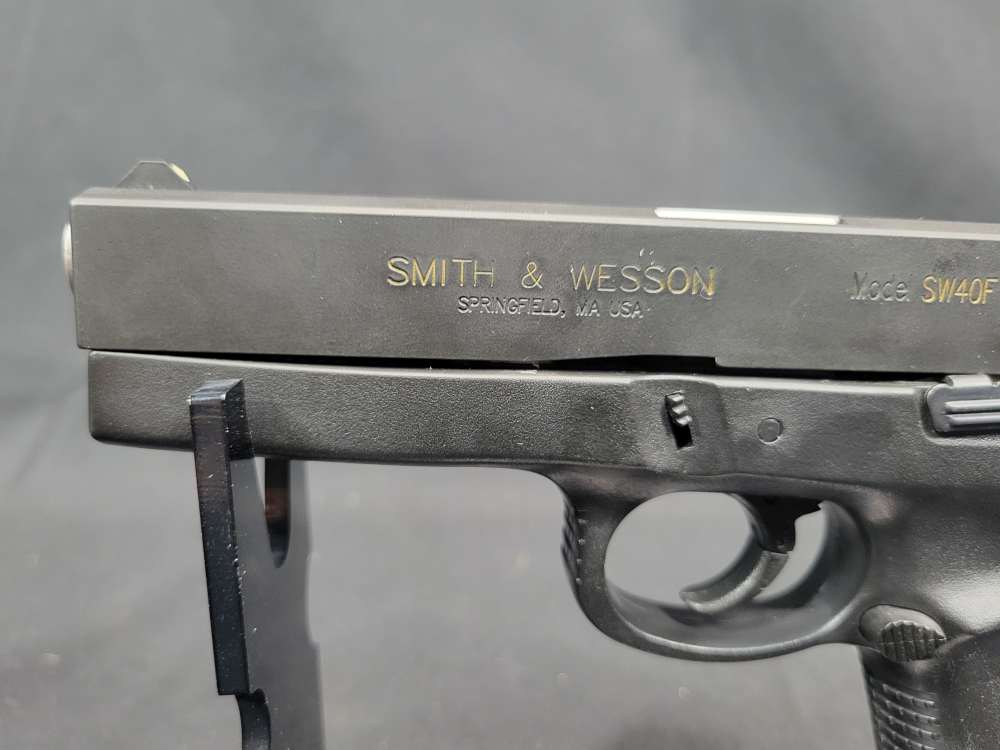 PENNY AUCTION SMITH & WESSON MODEL SW40F .40 S&W 15 RDS-img-3