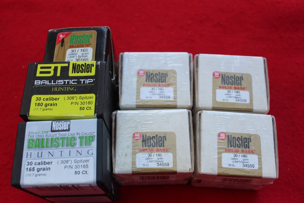 Large Lot of .30 Caliber Nosler Bullets-img-0