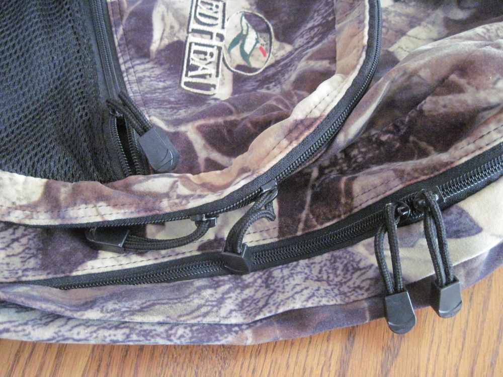 Red Head camouflage day pack.  Measures approx. 18” tall and 12" wide-img-3