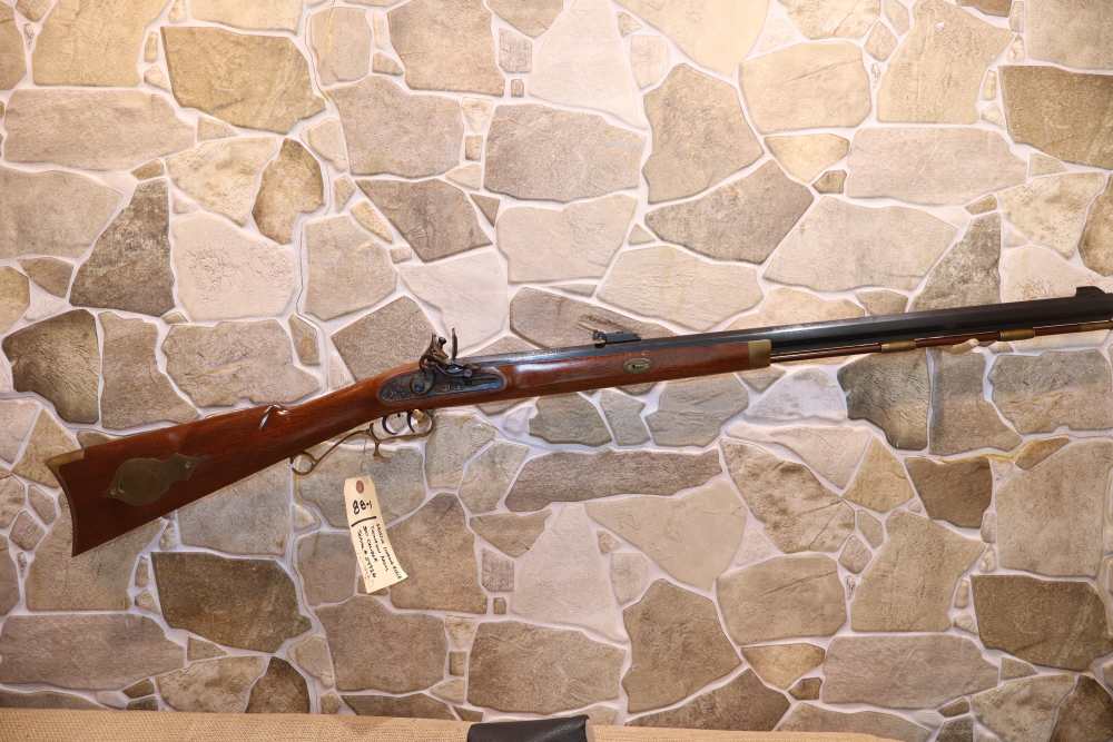 Thompson Center Arms 50 Cal. Flintlock Muzzleloader -img-0