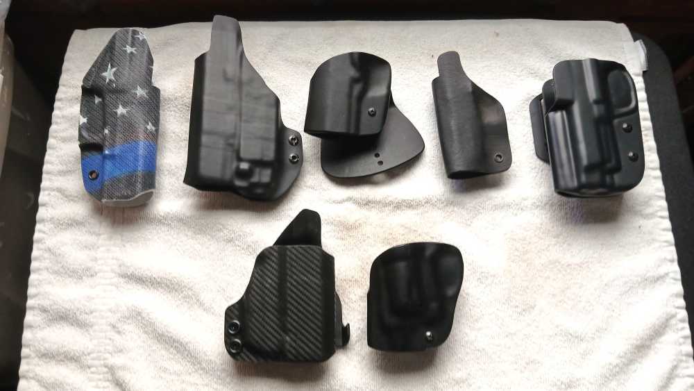  30-HOLSTER LOT — $75 STARTING BID -img-0