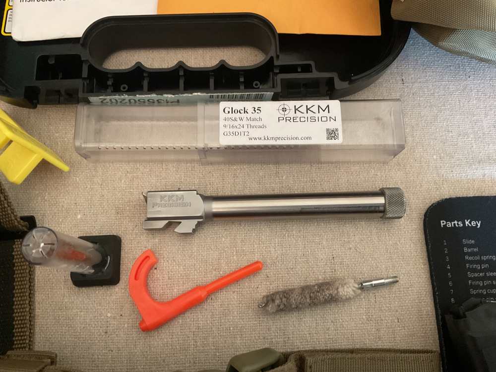 Glock G35 semiautomatic pistol with holster & carry bag-img-3