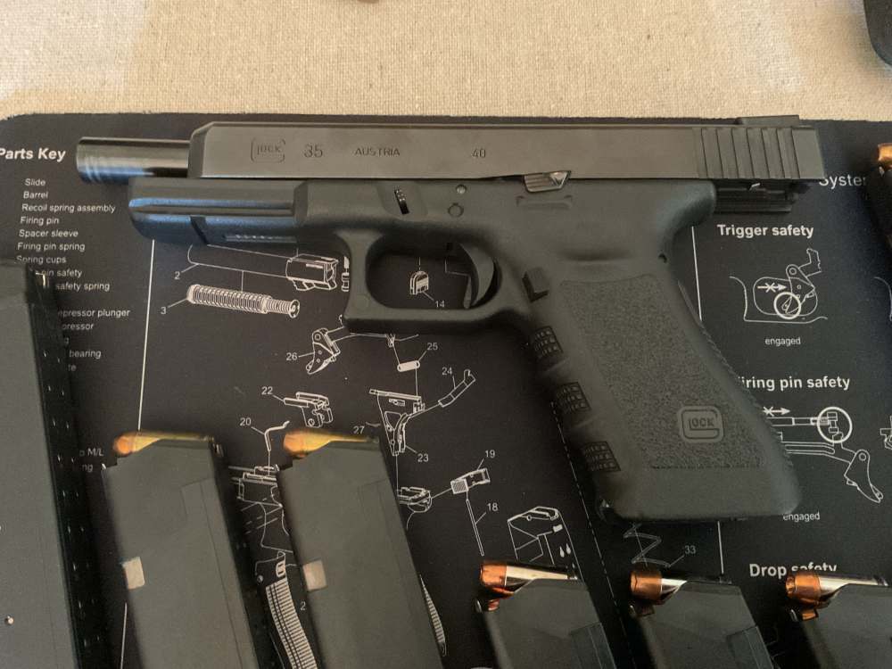 Glock G35 semiautomatic pistol with holster & carry bag-img-5
