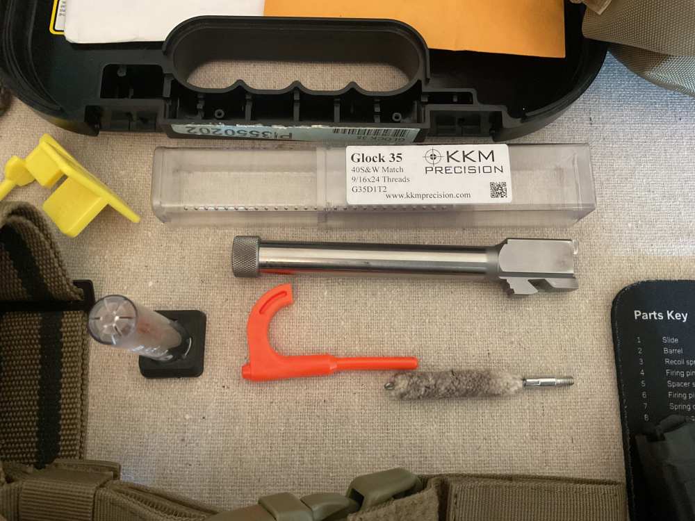 Glock G35 semiautomatic pistol with holster & carry bag-img-17