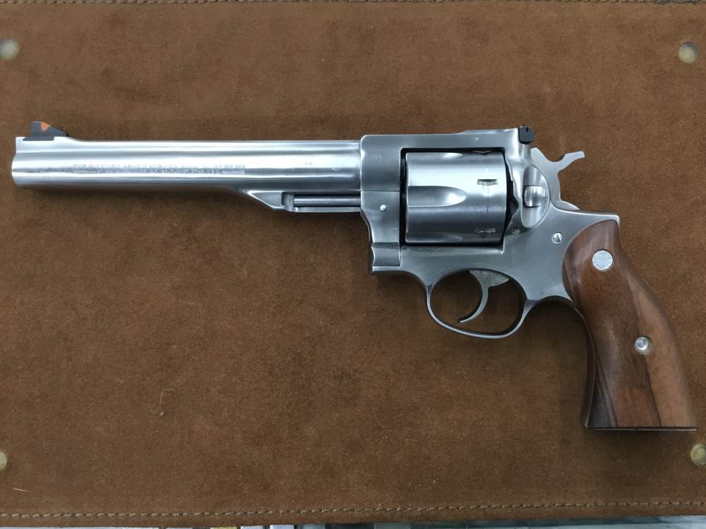 Ruger Redhawk - 44mag/7.5", SS - VG-EXC cond, og wood grips, barely used.-img-0