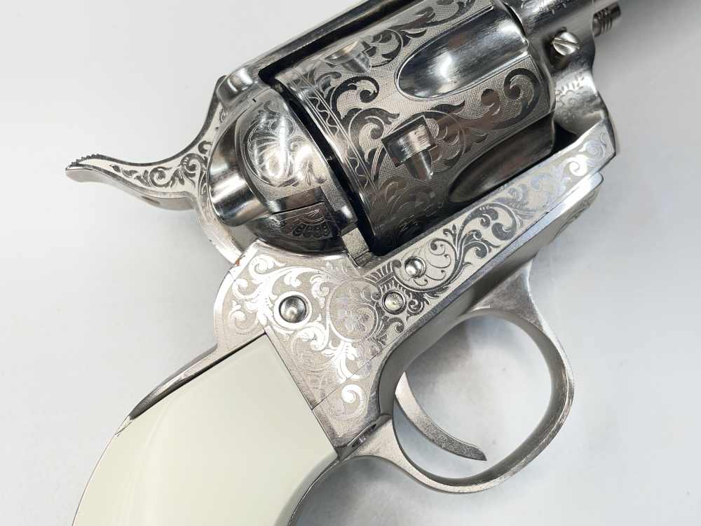 Taylor's & Co 1873 Outlaw Legacy nickel engraved 5.5" .357 mag SA revolver-img-4