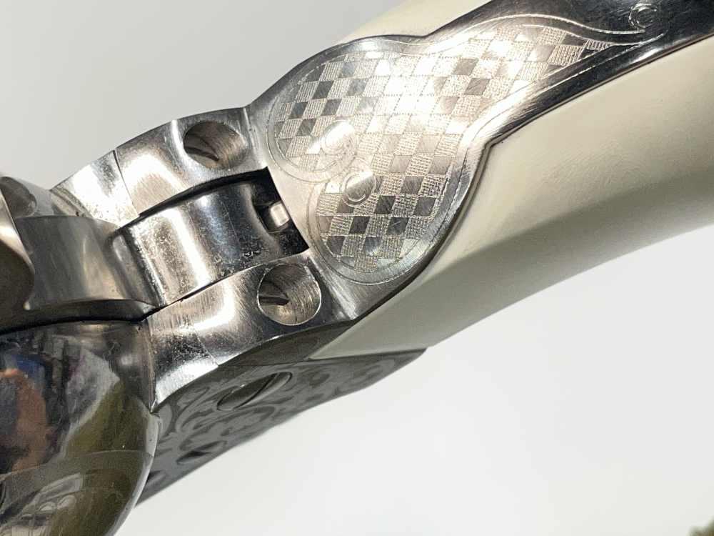 Taylor's & Co 1873 Outlaw Legacy nickel engraved 5.5" .357 mag SA revolver-img-22