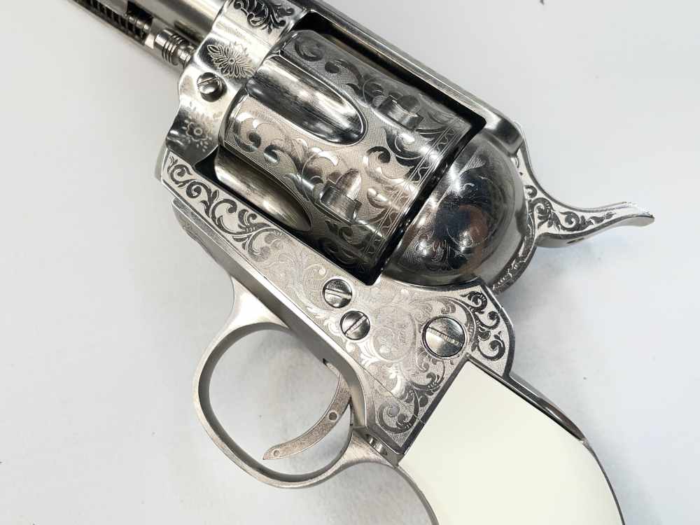 Taylor's & Co 1873 Outlaw Legacy nickel engraved 5.5" .357 mag SA revolver-img-8