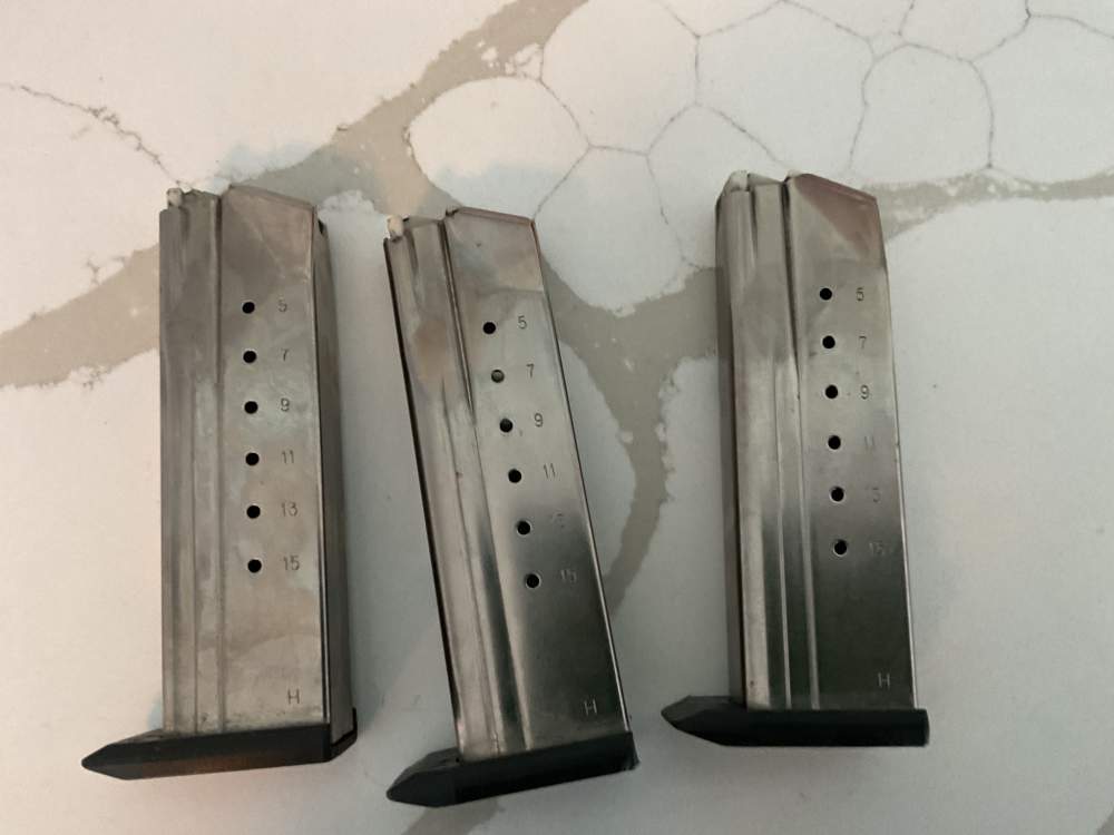 Three M&P S&W 9 mm magazines-img-1