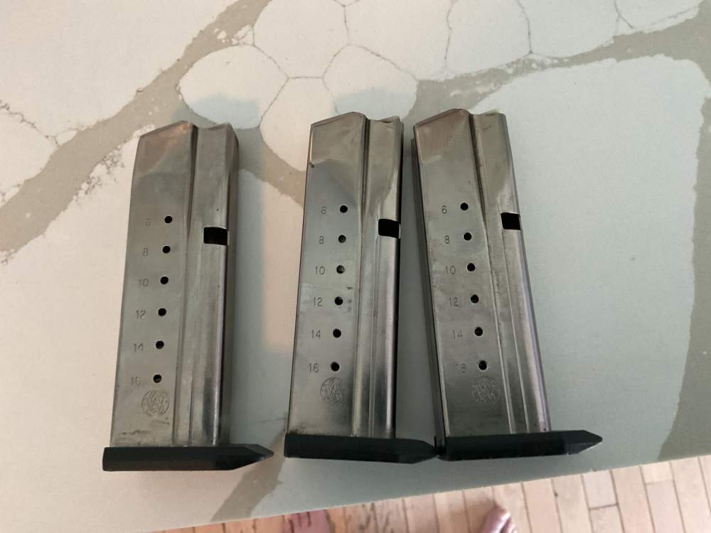Three M&P S&W 9 mm magazines-img-0