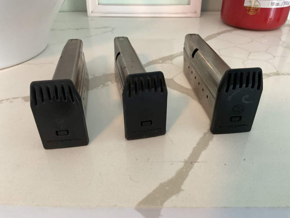 Three M&P S&W 9 mm magazines-img-3