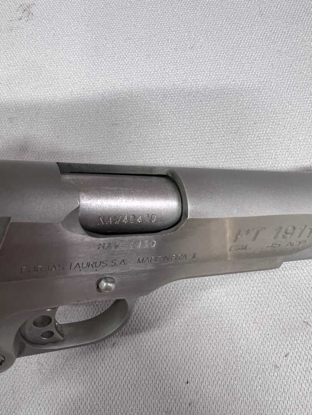 Taurus PT1911 stainless finish 45 ACP 5" barrel black grips white dot sight-img-18