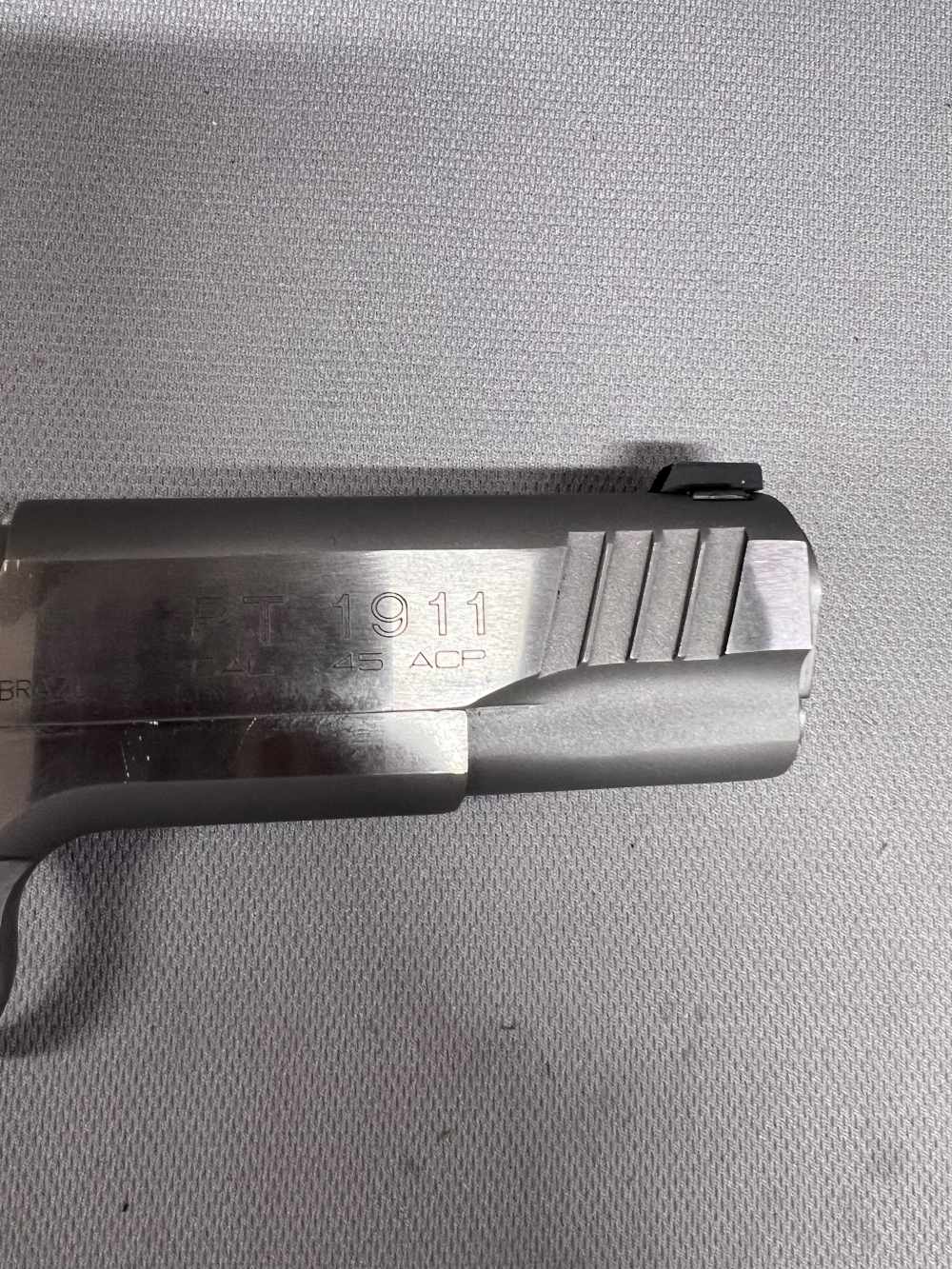 Taurus PT1911 stainless finish 45 ACP 5" barrel black grips white dot sight-img-12