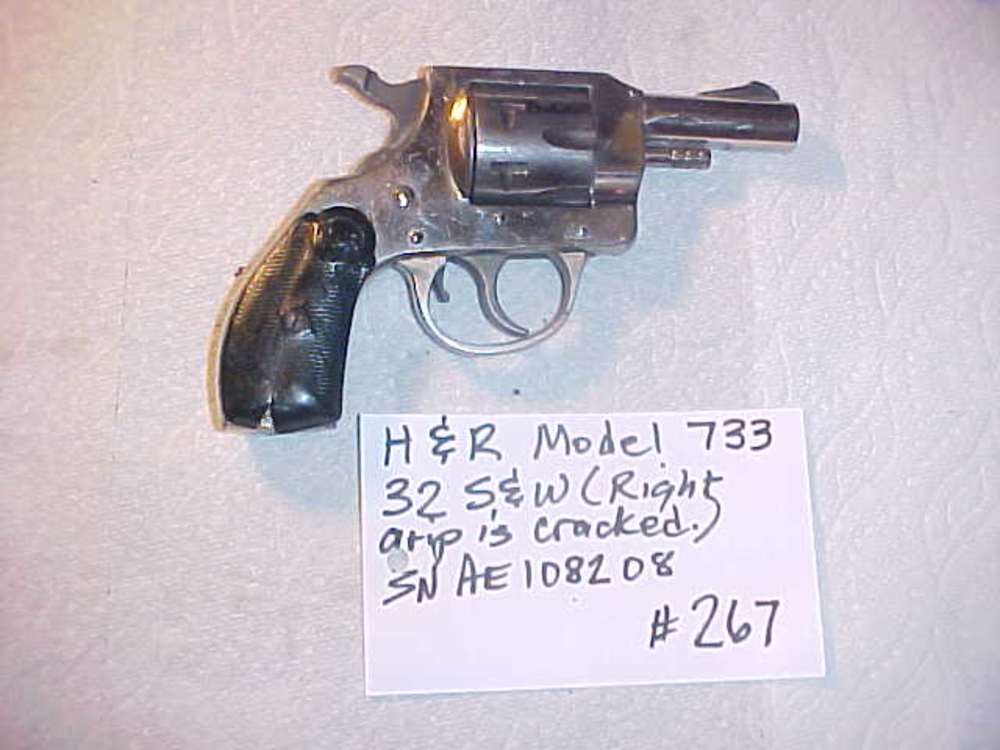 Item # 267 - H&R Model 733 - 32 S&W - Functions Well - Cracked right grip -img-1