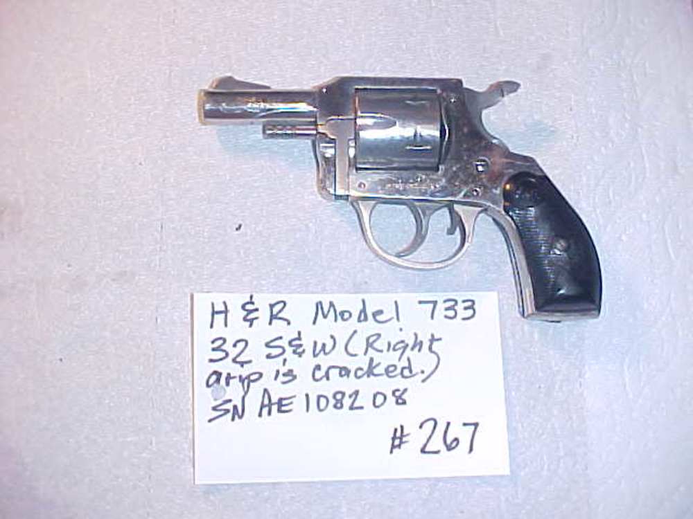Item # 267 - H&R Model 733 - 32 S&W - Functions Well - Cracked right grip -img-0