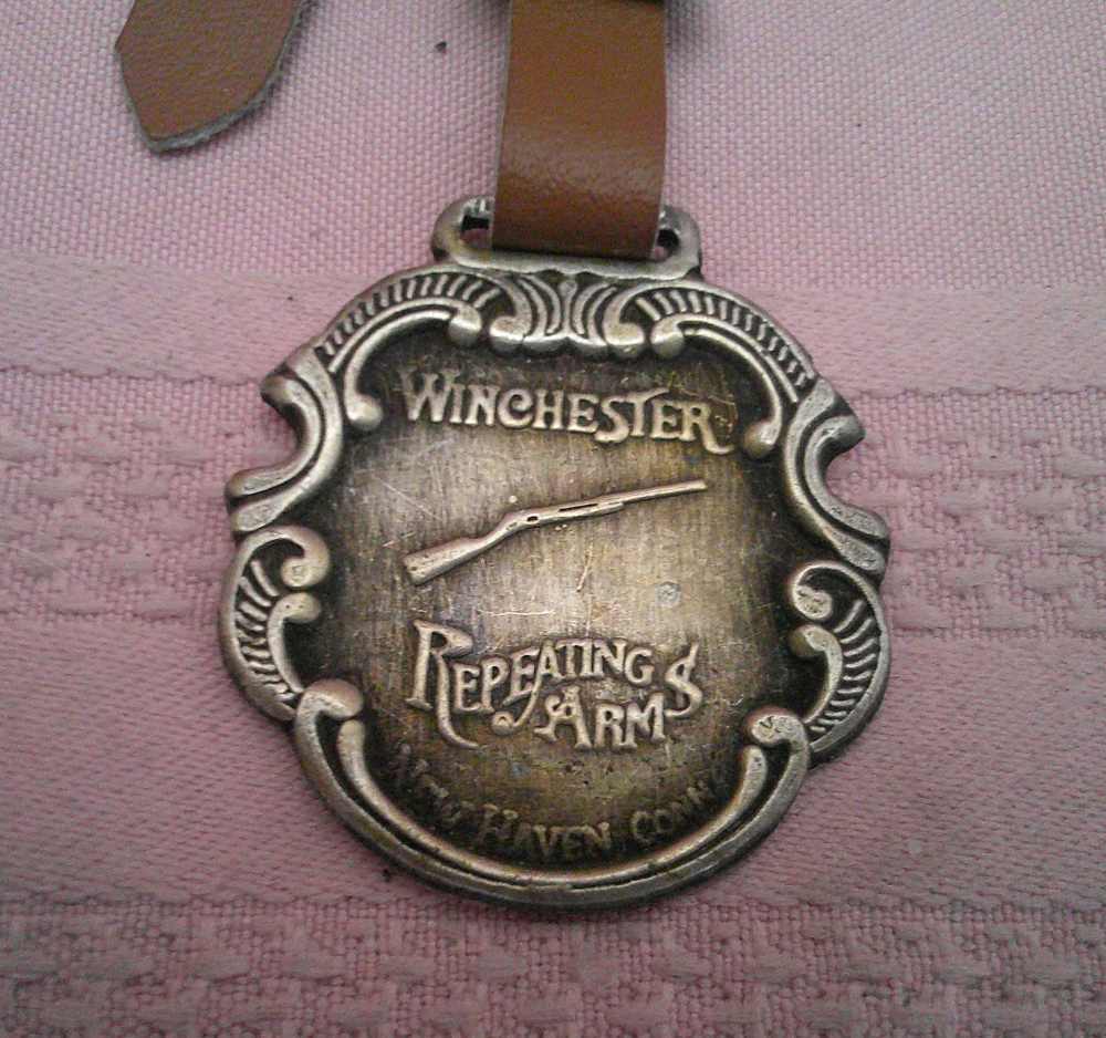 Rare Winchester Repeating Arms watch fob with raised rifle & leather strap!-img-1